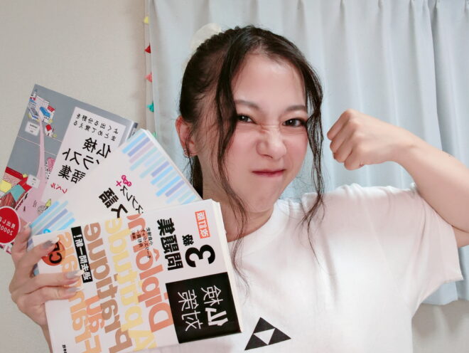 Japanese teacher studying with a textbook